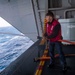 Sailor Dewaters Fire Hose