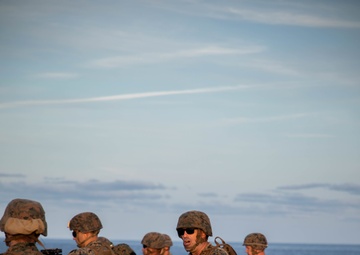 U.S. Marines conduct a range while underway aboard the USS Carter Hall