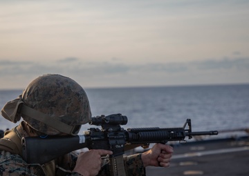 U.S. Marines conduct a range while underway aboard the USS Carter Hall