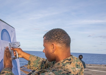 U.S. Marines conduct a range while underway aboard the USS Carter Hall