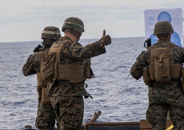 U.S. Marines conduct a range while underway aboard the USS Carter Hall