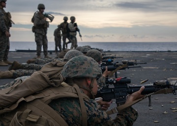 U.S. Marines conduct a range while underway aboard the USS Carter Hall