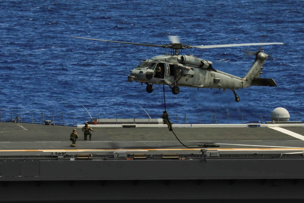 Abraham Lincoln Carrier Strike Group, Japan Maritime Self-Defense Force, Royan Australian Navy conduct Helicopter Visit, Board, Search, Seizure