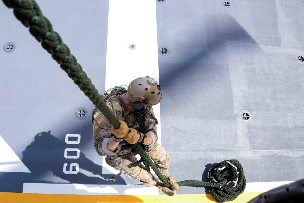 Abraham Lincoln Carrier Strike Group, Japan Maritime Self-Defense Force, Royan Australian Navy conduct Helicopter Visit, Board, Search, Seizure