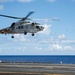 Japan Maritime Self-Defense Force SH-60K Seahawk helicopter lands aboard USS Abraham Lincoln