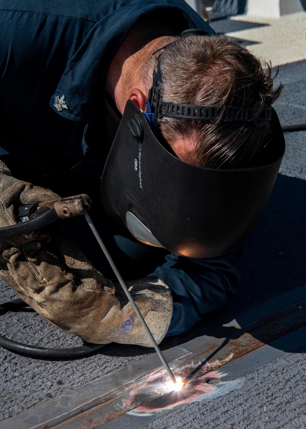 DVIDS Images Gridley conducts a welding job on the flight deck