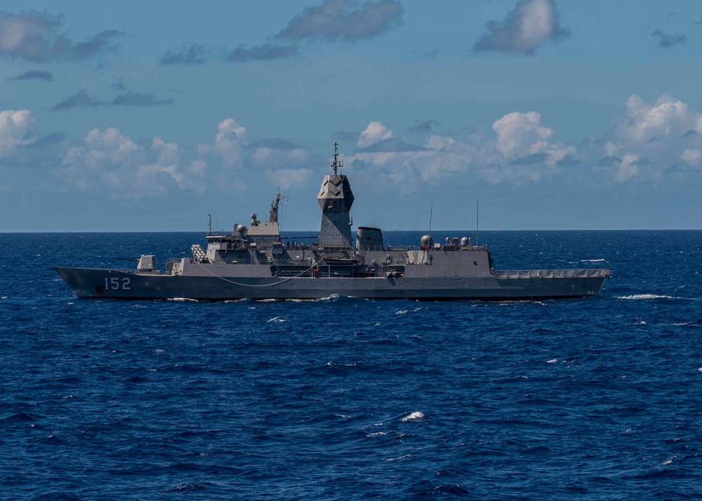 Abraham Lincoln Carrier Strike Group, Japan Maritime Self-Defense Force, Royal Australian Navy ships sail in formation