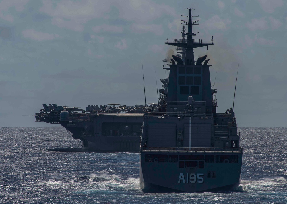 Abraham Lincoln Carrier Strike Group, Japan Maritime Self-Defense Force, Royal Australian Navy ships sail in formation