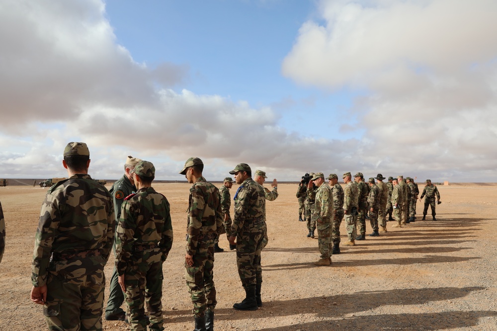 Distinguished guests from U.S. military greet U.S. and Moroccan military members outside Cap Draa during African Lion 22 at Tan Tan, Morocco