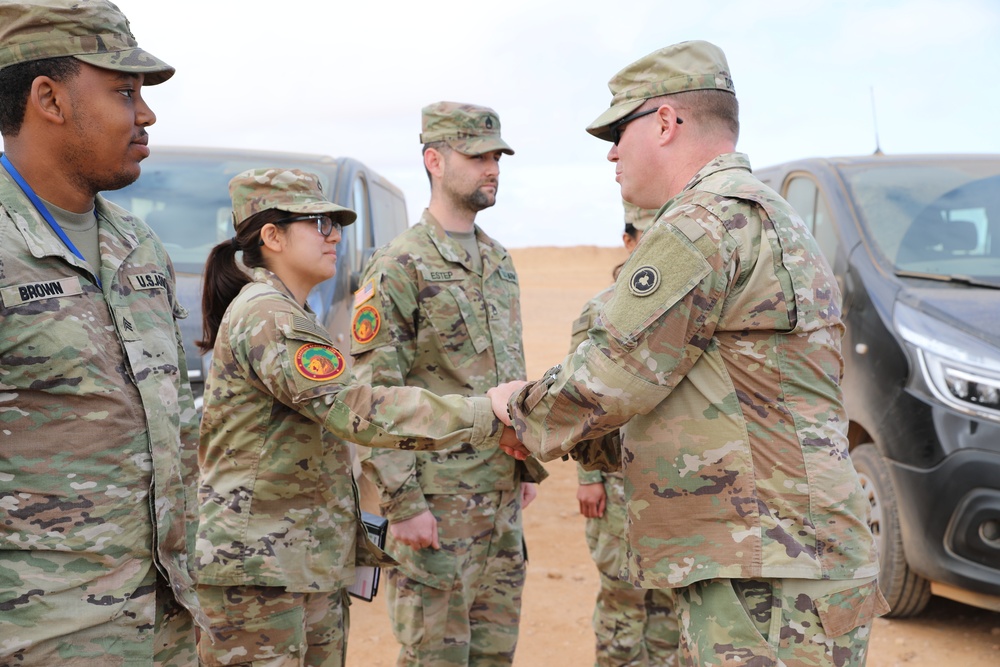 Distinguished guests from U.S. military greet U.S. and Moroccan military members outside Cap Draa during African Lion 22 at Tan Tan, Morocco