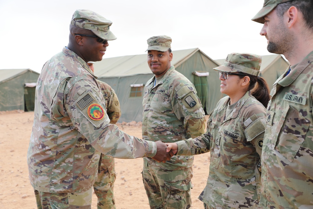 Distinguished guests from U.S. military greet U.S. and Moroccan military members outside Cap Draa during African Lion 22 at Tan Tan, Morocco