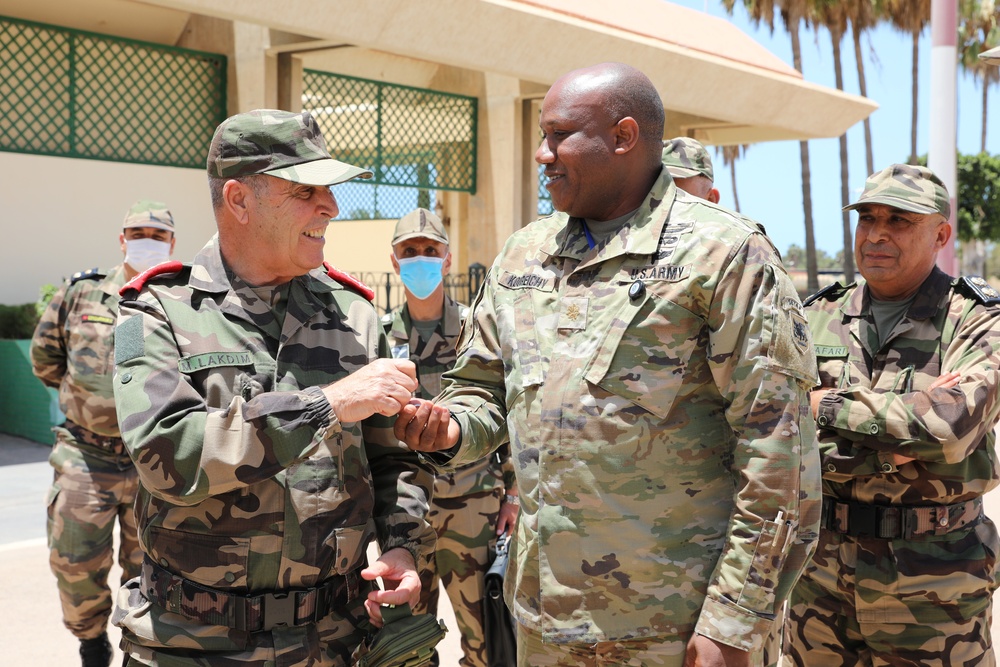 Distinguished guests from U.S. military greet U.S. and Moroccan military members outside Cap Draa during African Lion 22 at Tan Tan, Morocco