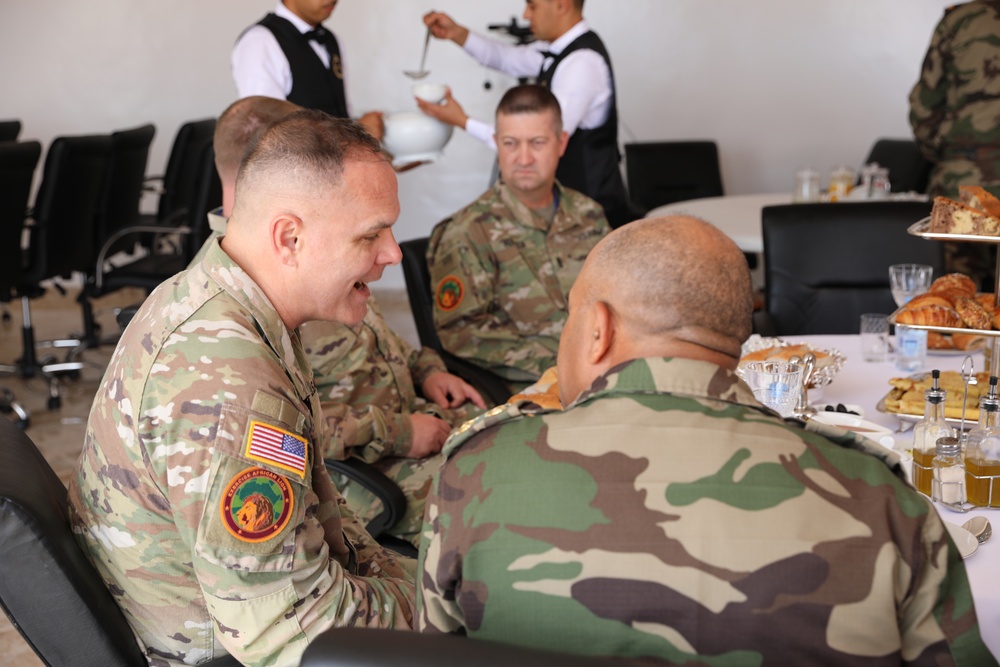 Distinguished guests from U.S. military greet U.S. and Moroccan military members outside Cap Draa during African Lion 22 at Tan Tan, Morocco