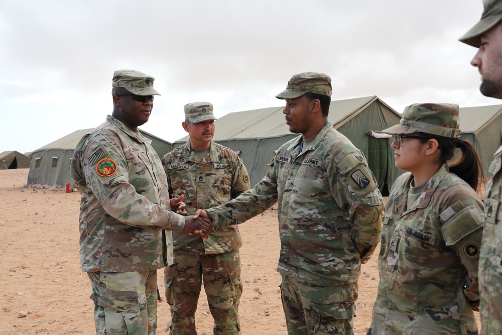 Distinguished guests from U.S. military greet U.S. and Moroccan military members outside Cap Draa during African Lion 22 at Tan Tan, Morocco