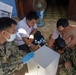 U.S. Navy and Vietnamese Medical Technicians Perform Medical Equipment Maintenance During PP22