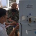 U.S. Navy and Vietnamese Medical Technicians Perform Medical Equipment Maintenance During PP22