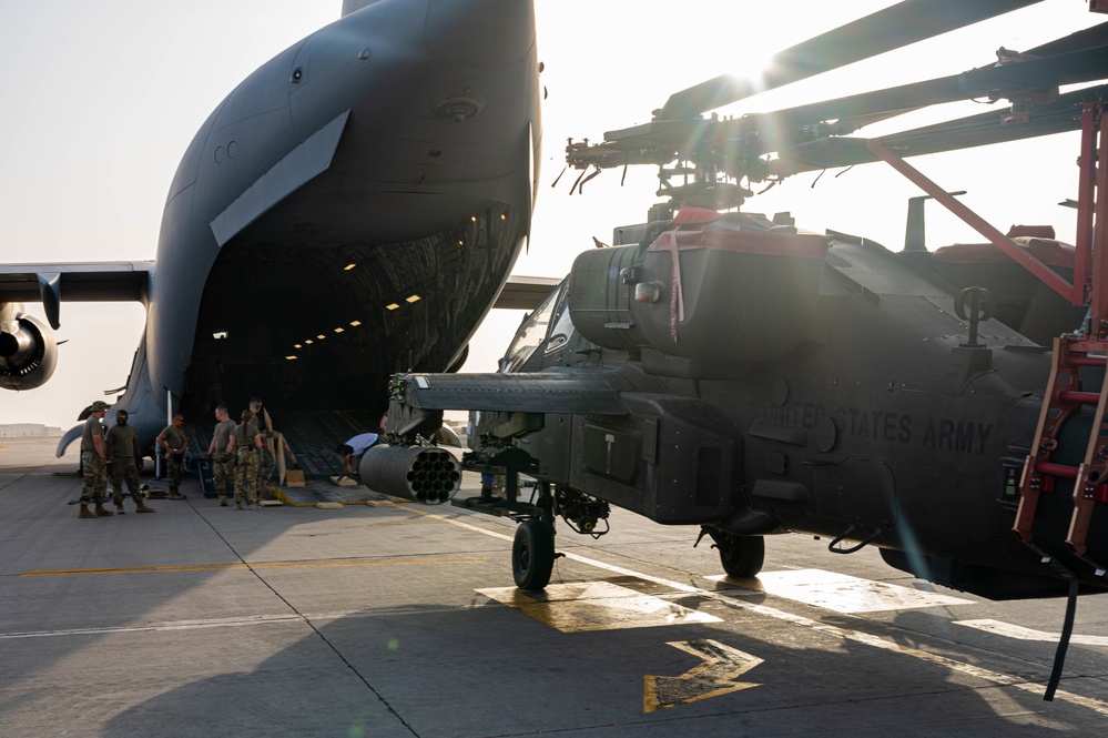 U.S. Air Force and Army conduct movement of Apache helicopters