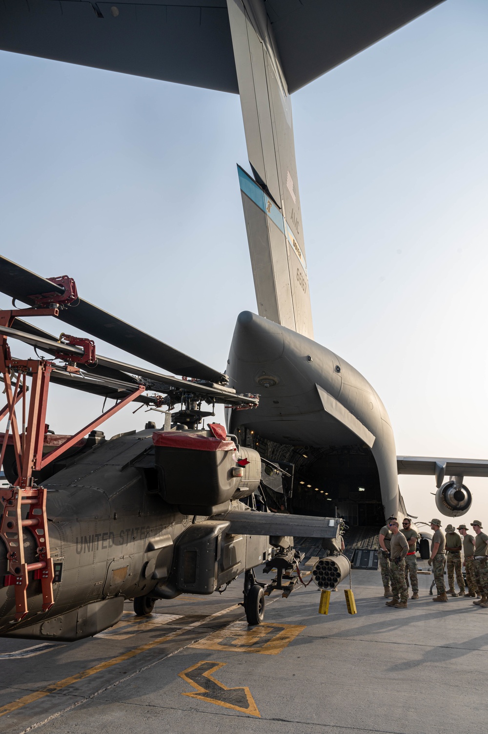 U.S. Air Force and Army conduct movement of Apache helicopters