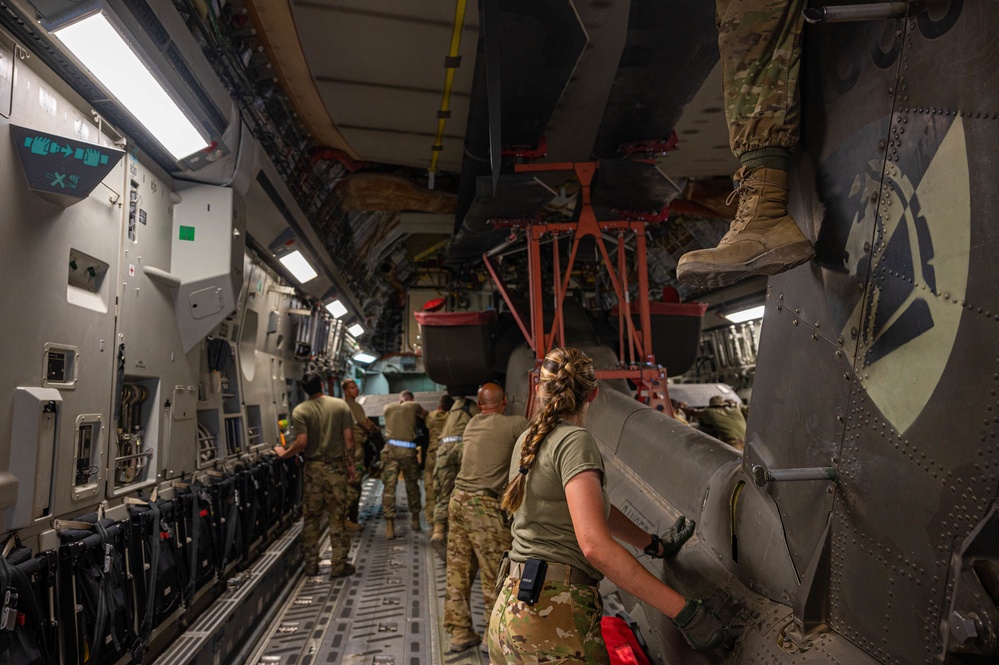 U.S. Air Force and Army conduct movement of Apache helicopters