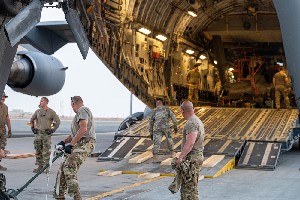 U.S. Air Force and Army conduct movement of Apache helicopters