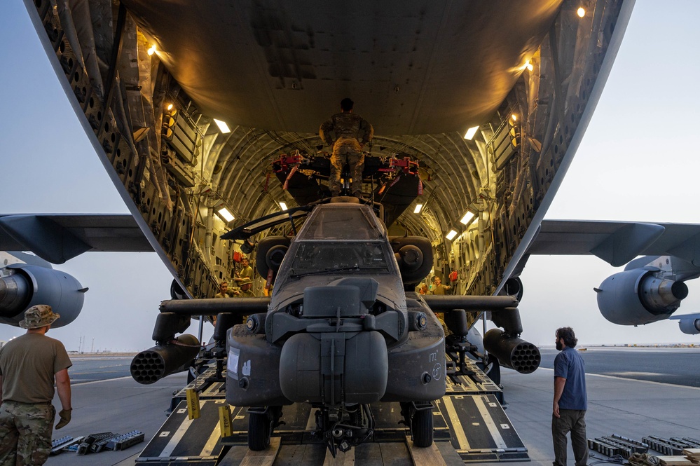 U.S. Air Force and Army conduct movement of Apache helicopters