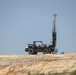 Contractors drill soil samples at troop project site at Fort McCoy