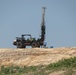 Contractors drill soil samples at troop project site at Fort McCoy