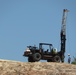 Contractors drill soil samples at troop project site at Fort McCoy