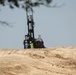Contractors drill soil samples at troop project site at Fort McCoy