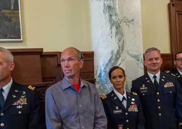 Michelle Hartley presented awards at retirement