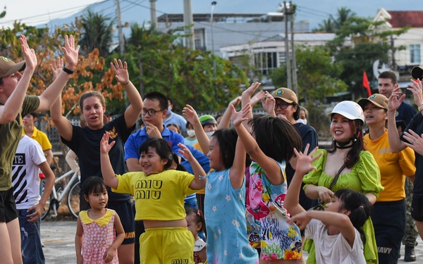 U.S. Pacific Fleet Band and Members of JMSDF Band Perform at Song Cau Stadium in Vietnam during Pacific Partnership 2022