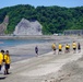 CFAY Sailors pick up trash at the Zushi Beach clean-up