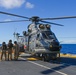 Chilean ship CNS ALMIRANTE LYNCH's helicopter conducts cross-deck training with HMCS VANCOUVER en route to RIMPAC 2022