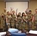 Airmen pose with their IVs