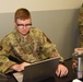 Airman controls simulated weather and light conditions