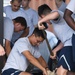 Airmen prepare sand bags for hurricane season