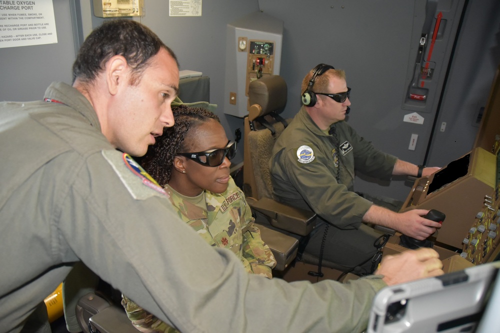 Maj Moore sitting in boom seat on KC-46