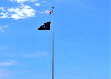 Photo Essay: Fort McCoy police fly special flag for department