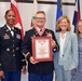 Handura presented service awards prior to change of command