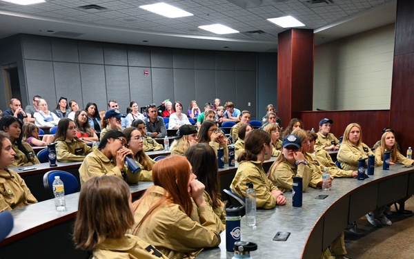 19th AW commander speaks at "S.H.E. Can" aviation camp graduation