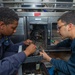 USS Antietam (CG 54) Sailors Install Reefer
