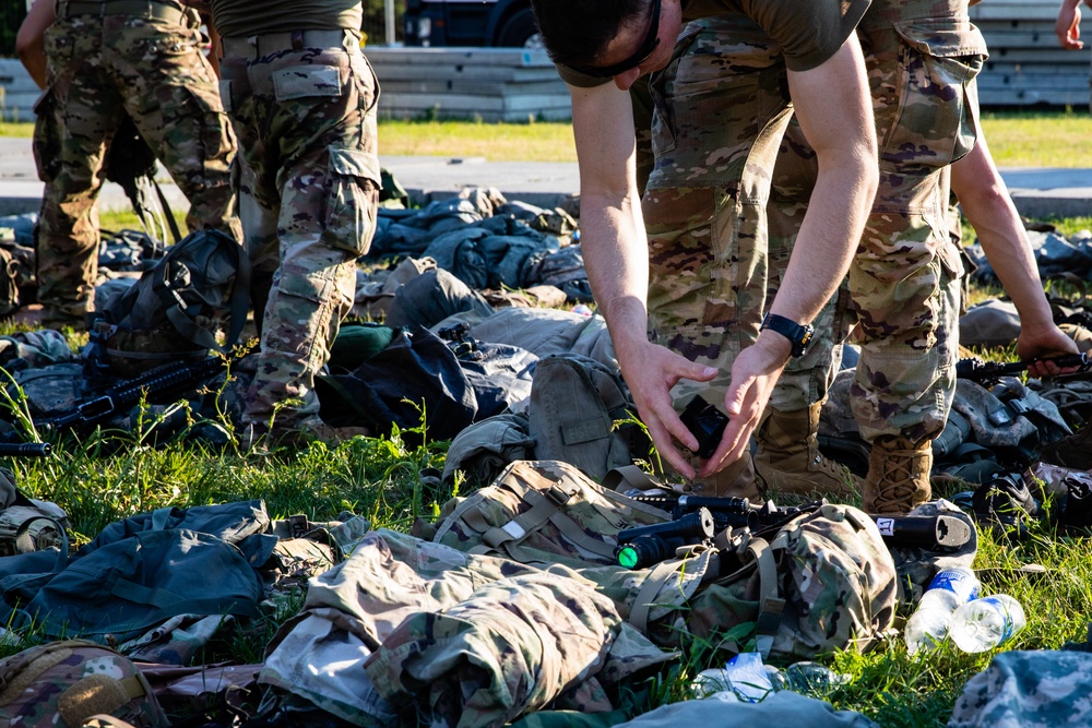 Spur Candidates Conduct an Equipment Inspection During a Spur Ride