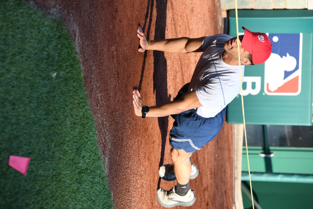 Service members participate in the Nationals HIIT workout