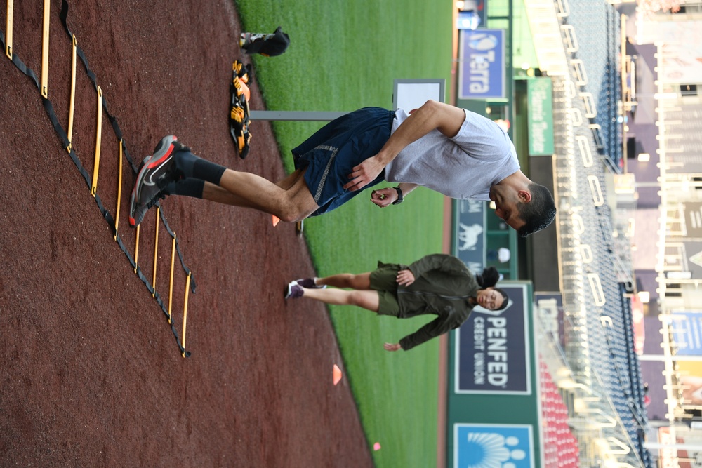 Service members participate in the Nationals HIIT workout