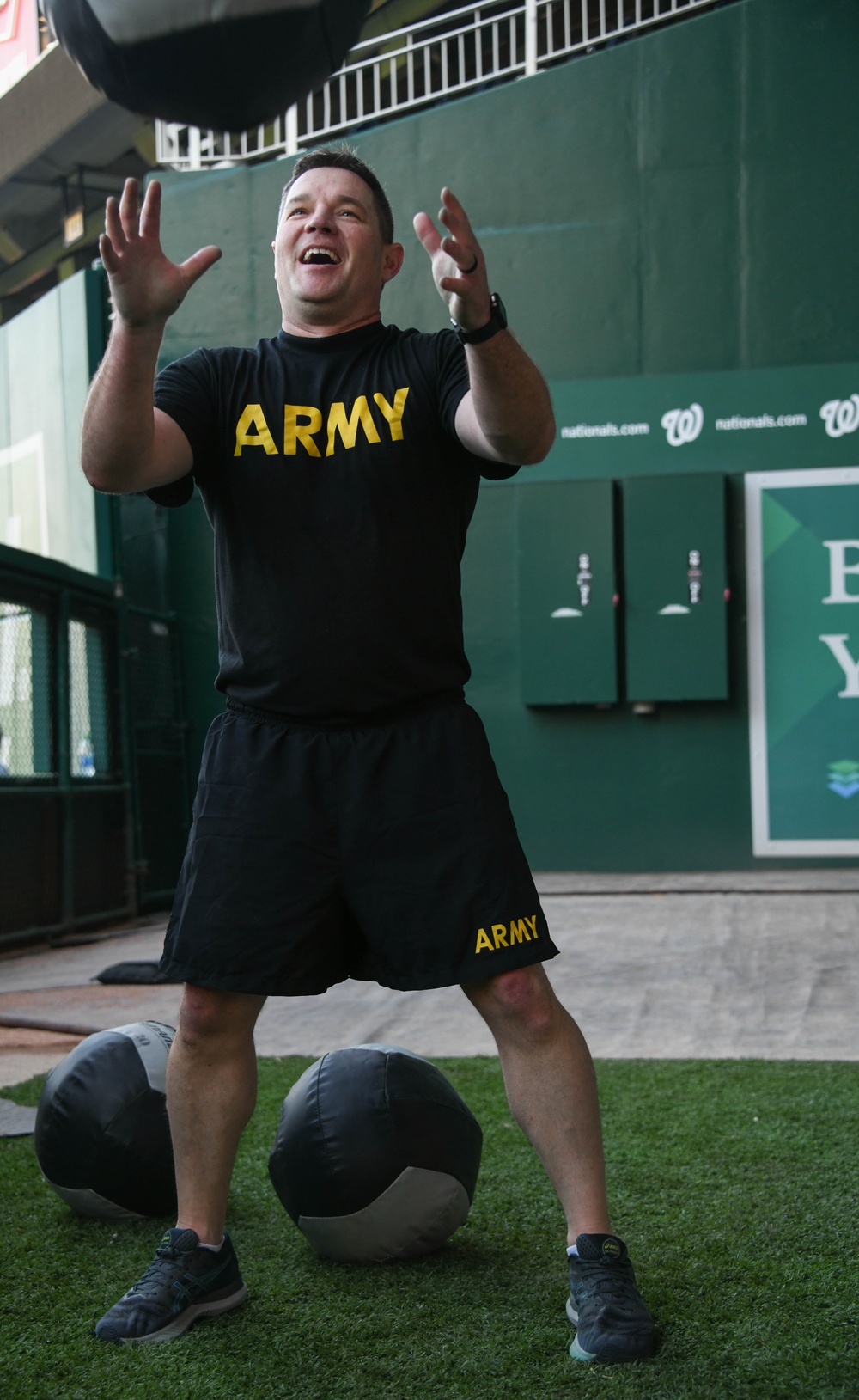 Service members participate in the Nationals HIIT workout