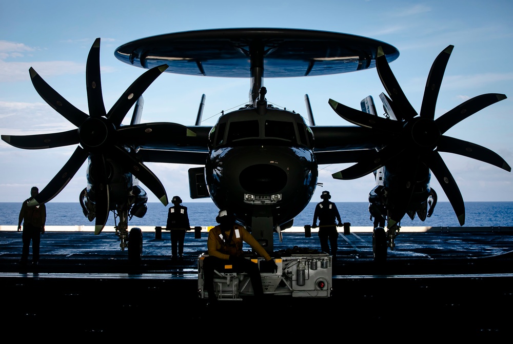 Carrier Airborne Early Warning Squadron (VAW) 121 Sailors Transport an E-2D Hawkeye Aircraft Aboard USS George H.W. Bush (CVN 77)