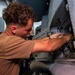 Helicopter Maritime Strike Squadron (HSM) 46 Sailor Conducts Maintenance on a MH-60R Sea Hawk Helicopter Aboard USS George H.W. Bush (CVN 77)