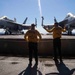 USS George H.W. Bush (CVN 77) Sailors Signal Elevator