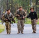 Spur Candidates Conduct a Ruck March During a Spur Ride