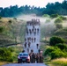 Spur Candidates Conduct a Ruck March During a Spur Ride